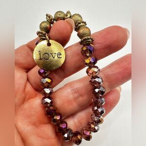 Gold tone "love" charm, beads and crystal glass stretchy beaded bracelet!!